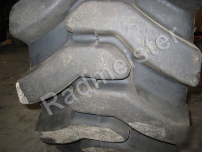 Set of 2 used flat proof skid steer tire 15