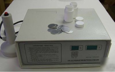 Electromagnetic induction aluminum foil cap machine