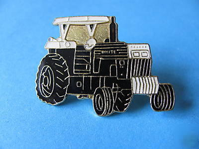 Vintage ' white' tractors pin badge. massey, chalmers