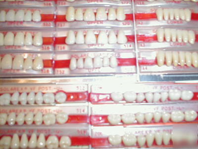 New large lot of porcelain denture teeth and carded