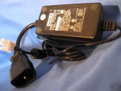 Symbol 50-24000-021 ac adapter +12V 1A 2 pin clip plug