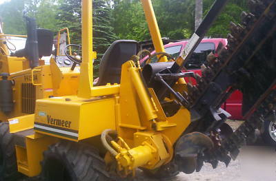 Riding trencher/backhoe