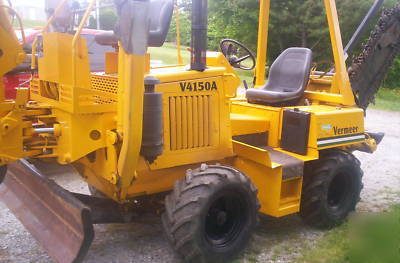 Riding trencher/backhoe