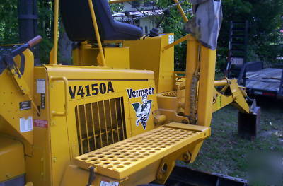 Riding trencher/backhoe