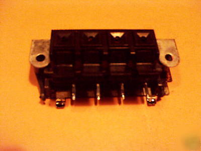 Four place snap-in terminal strip assembly / jack panel