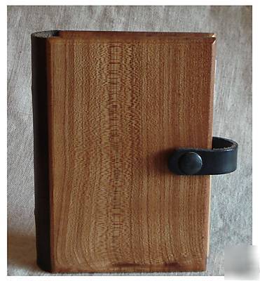 Compact organiser made from elm with leather catch