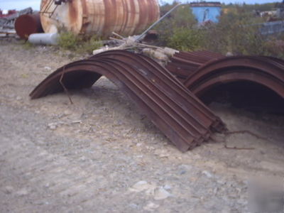 Steel support arch assembly for storage/repair building