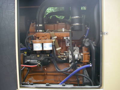 1999 generac 100 kw diesel generator with housing,tank