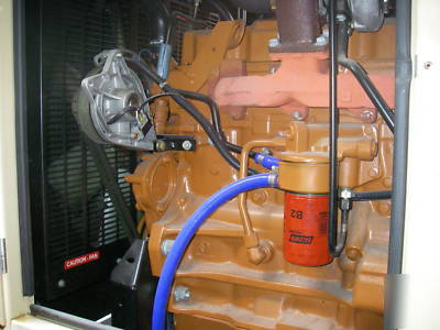 1999 generac 100 kw diesel generator with housing,tank