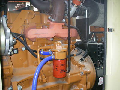 1999 generac 100 kw diesel generator with housing,tank