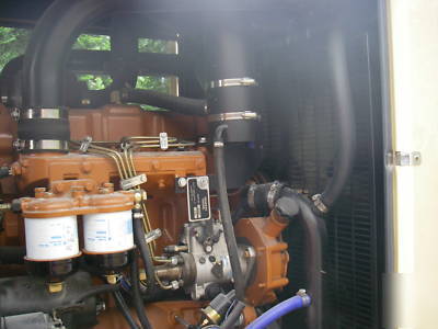 1999 generac 100 kw diesel generator with housing,tank
