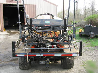 Smithco-4 wheel utility sprayer dump-hyd .platform