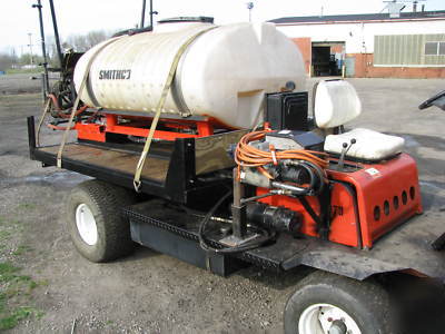 Smithco-4 wheel utility sprayer dump-hyd .platform