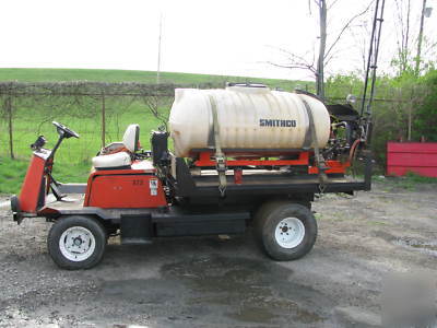 Smithco-4 wheel utility sprayer dump-hyd .platform