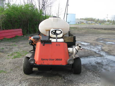 Smithco-4 wheel utility sprayer dump-hyd .platform