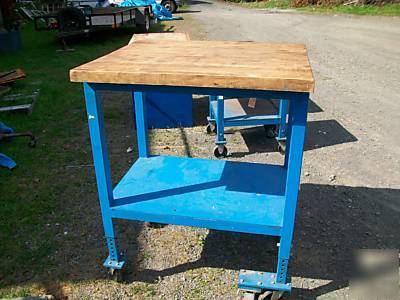 Vintage industrial butcher work table on wheels old