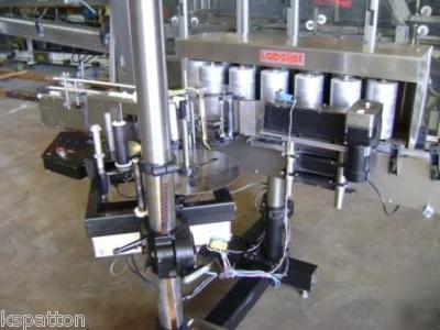 Label jet pressure sensitive labeler wrap around label