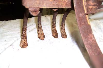 Vintage iron age hand garden wheel cultivator