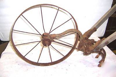 Vintage iron age hand garden wheel cultivator