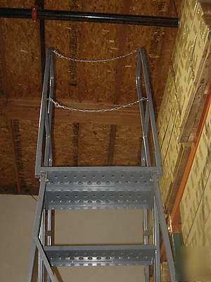 Industrial rolling ladder 14 step mint condition w/lock
