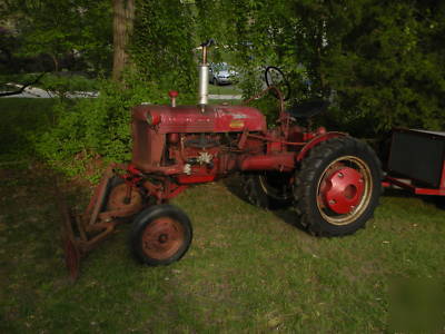 1950 farmall cub tractor with accessories