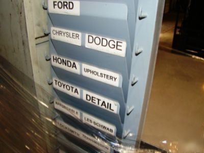 Lot of file cabinets and a wall rack