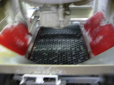 Rotofinish cenerifugal up-flow spin finisher