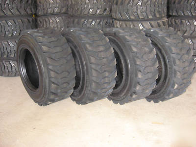 Set of (4) 12 x 16.5 (12 ply) skid steer / bobcat tires