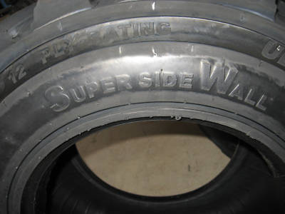 Set of (4) 12 x 16.5 (12 ply) skid steer / bobcat tires