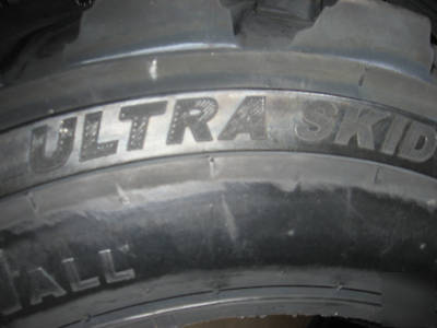 Set of (4) 12 x 16.5 (12 ply) skid steer / bobcat tires