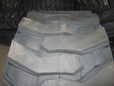 Set of (4) 12 x 16.5 (12 ply) skid steer / bobcat tires