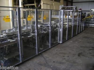 Thiele wrap around continuous motion case packer