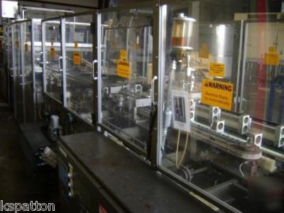 Thiele wrap around continuous motion case packer