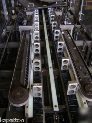 Thiele wrap around continuous motion case packer