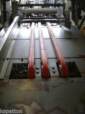 Thiele wrap around continuous motion case packer