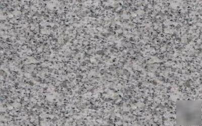 Solid granite bath surrounds--speckled grey