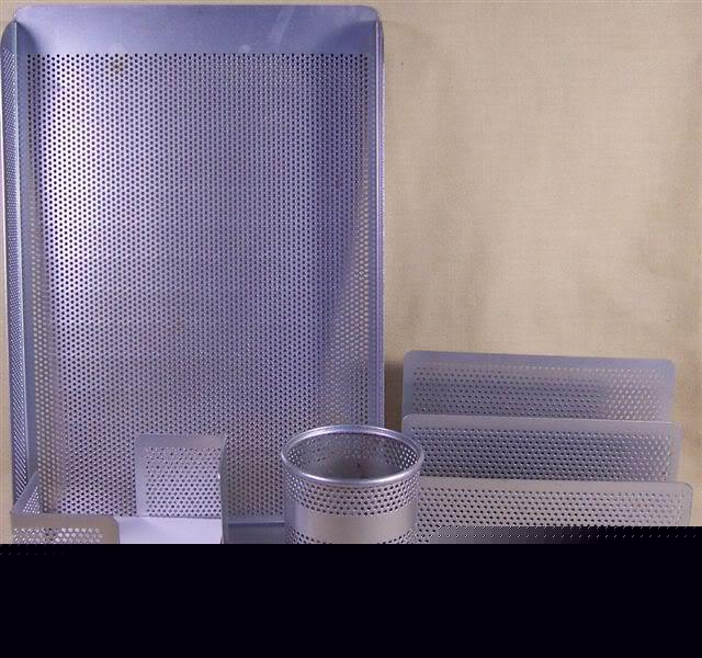 Sleek four piece gray perforated steel desk set guc