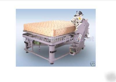 Mattress tape edge sewing machine and table