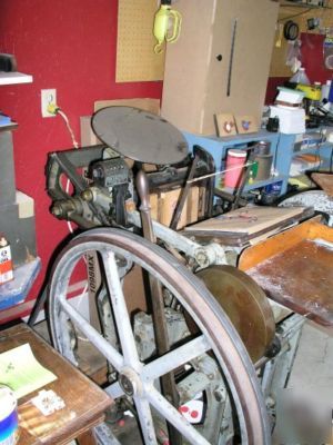 Letterpress print shop with motorized platen press