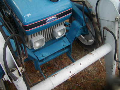 Bush hog front end loader off a ford 3910 tractor 4WD