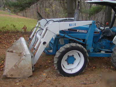 Bush hog front end loader off a ford 3910 tractor 4WD