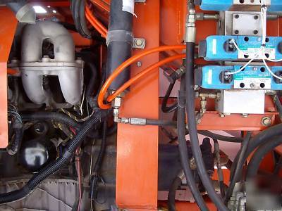 2004 snorkel TB60 4X4 boomlift dual fuel 110 generator
