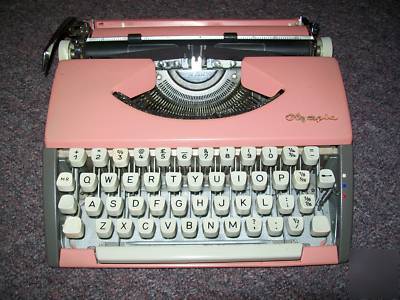 Rare pink olympia deluxe portable typewriter,no case.