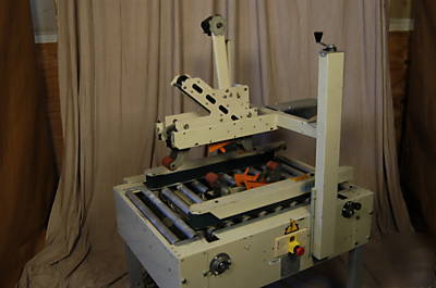 Sta-52 uniform semi-automatic top & bottom case sealer