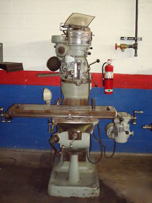 Bridgeport mill w/ power feed & slotting head. 42