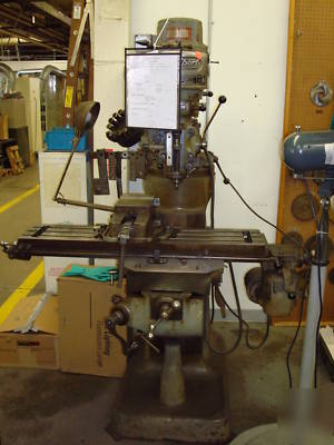 Bridgeport mill w/ power feed & slotting head. 42