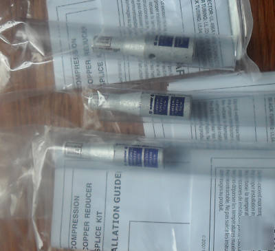 Burndy hy reducer ( in line taps ) 3 taps. brown,purple