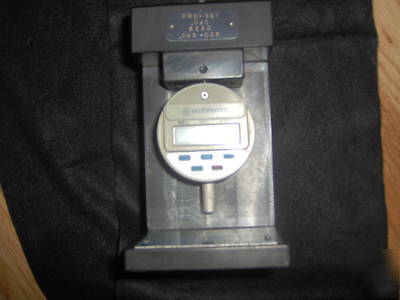Mitutoyo 543-135B mounted on howell tool & gage fixture