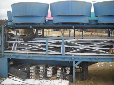 Tilt a whirl carnival ride on a semi trailer amusement