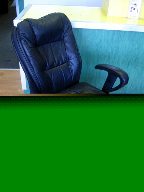 Black leather padded reclining office chair wheeled